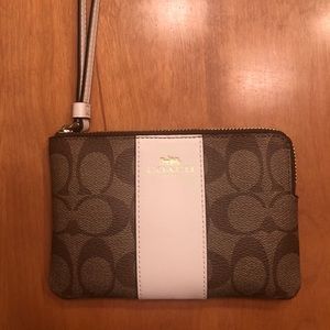 Coach corner zip wristlet in signature canvas